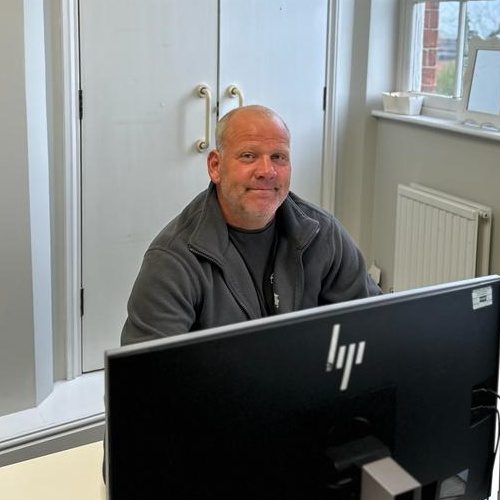 nigel towlson at desk